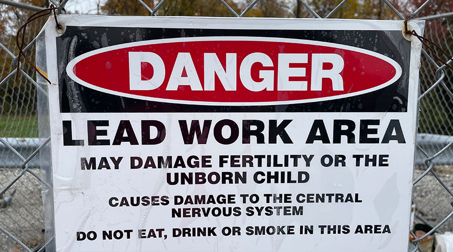 a sign detailing the dangers of lead